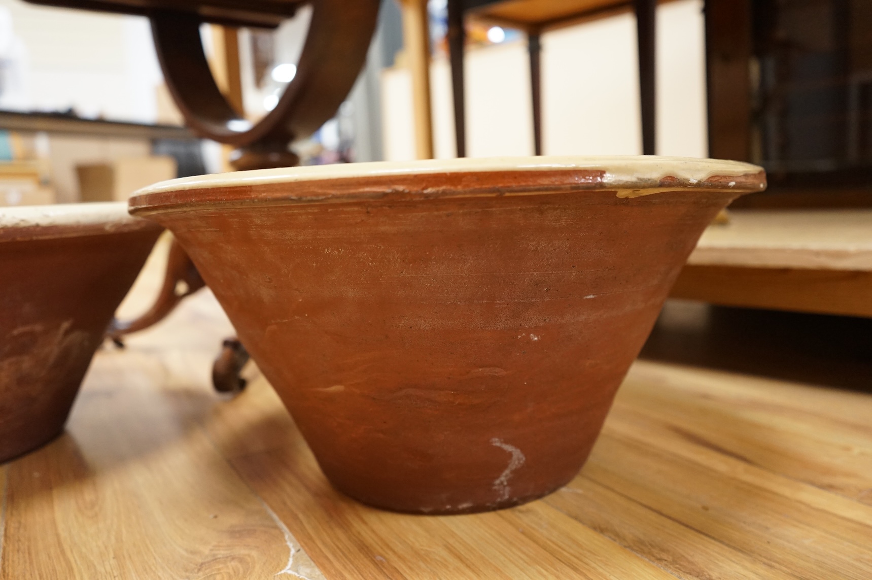 A pair of large slipware dairy bowls, 44cm diameter